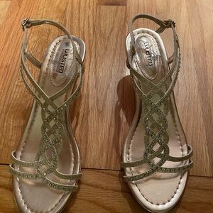 Gold sandals size 7 worn once.
